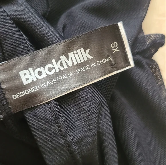 Elegant Black Dress with Sheer Sleeves - Picture 11 of 14